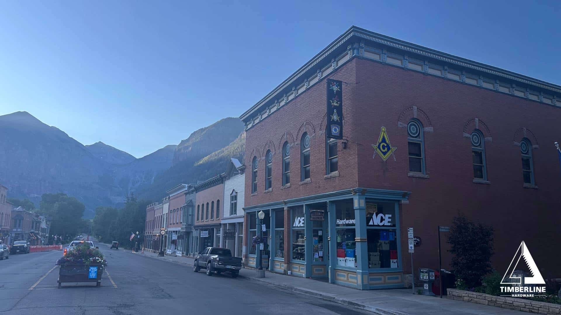 Photo of Timberline Ace Hardware building with mountains in the background