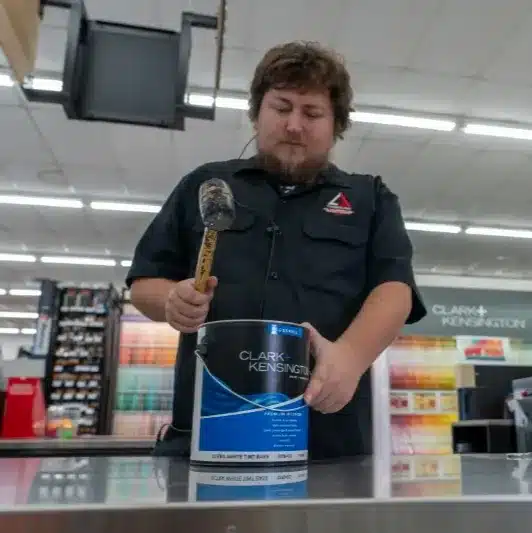 employee of timberline ace of clifton making paint