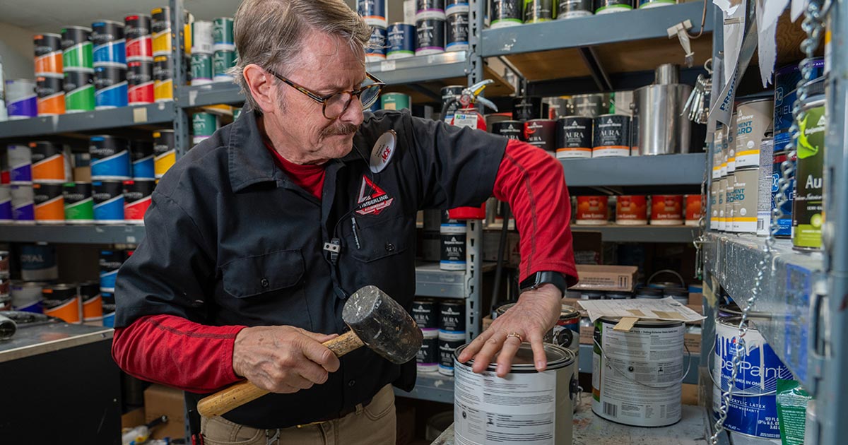 Timberline Ace Hardware's paint department guru, David, preparing a can