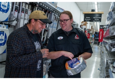 Timberline Ace Hardware of Clifton team member helping customer find materials for project