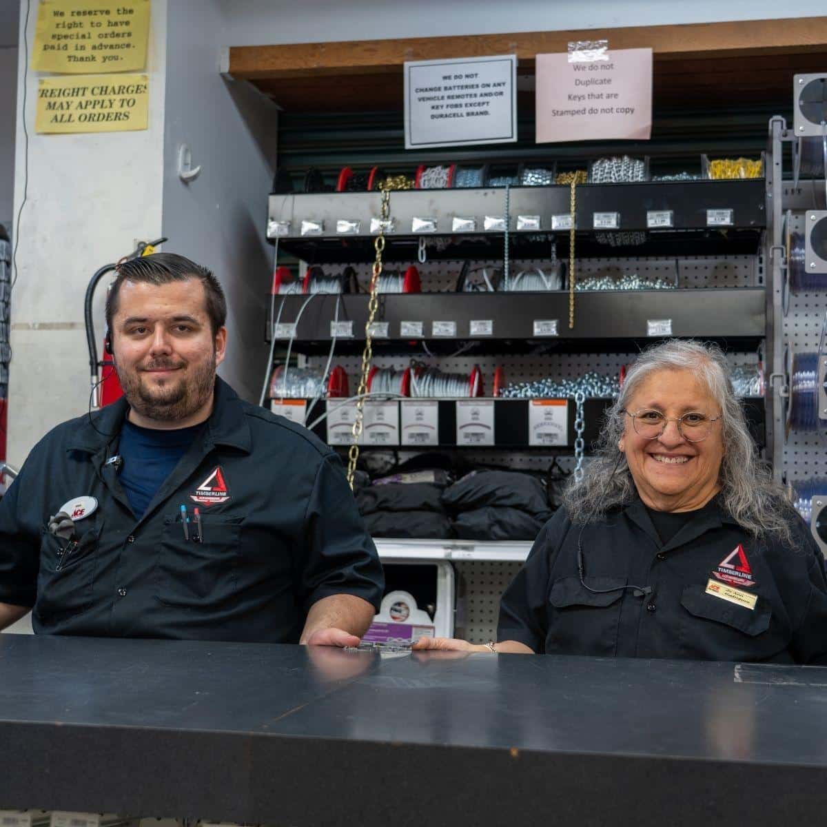 Team members helping customers at the service counter at Timberline Ace Hardware of Aspen