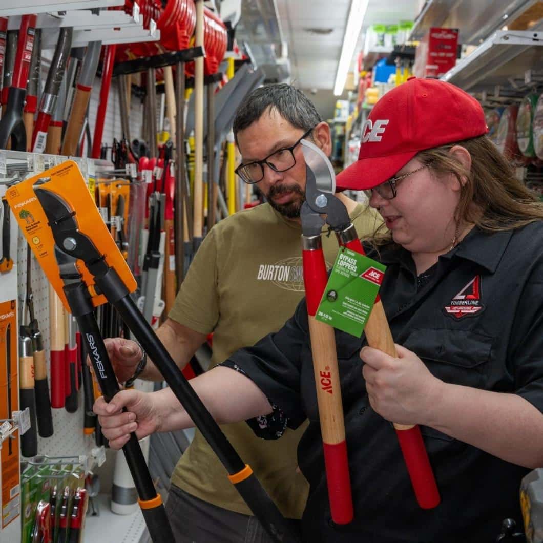 Customer and team member comparing pruning tools at Timberline Ace Hardware of Telluride